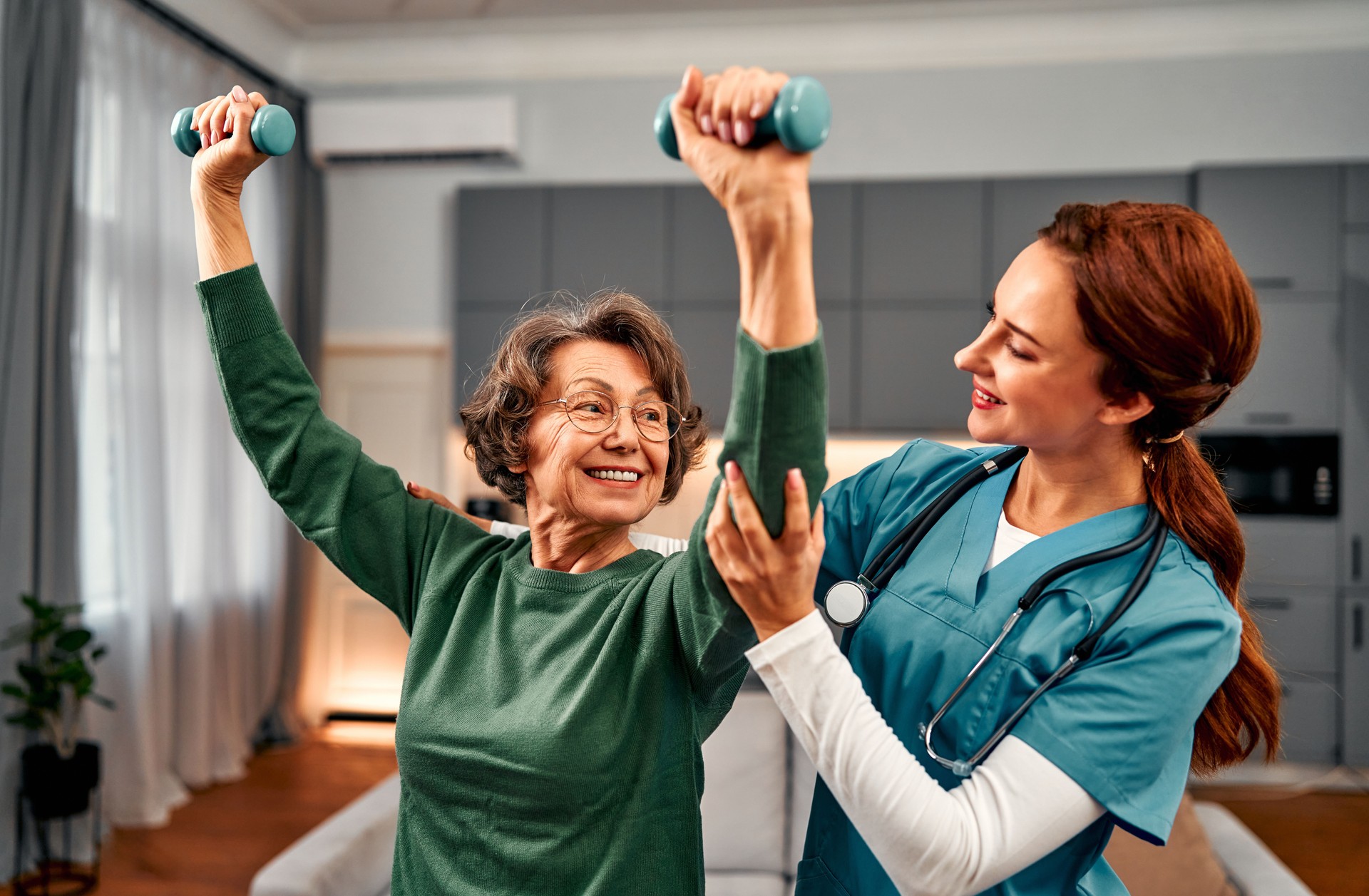 Rehabilitation physiotherapy.Therapist assisting senior woman with exercises in nursing home.